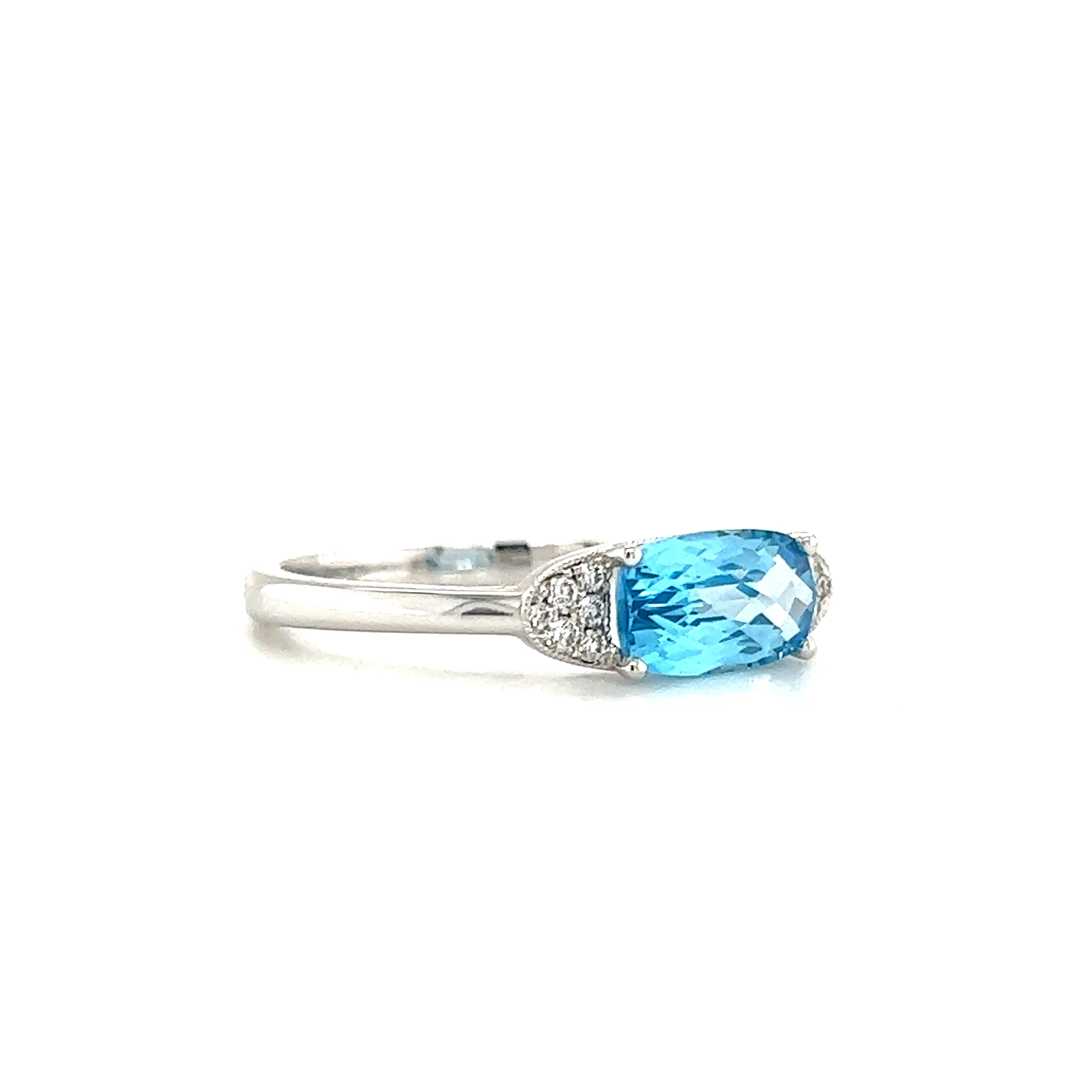Elongated Blue Topaz Ring with Twelve Side Diamonds in 14K White Gold